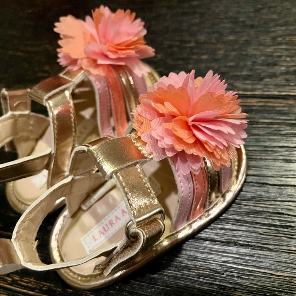 Laura Ashley baby girl sandals. Gold with pink and coral accents. Size 2